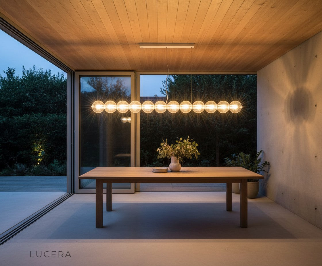 Lucera Vermeil glass pendant light as focal point in elegant entryway