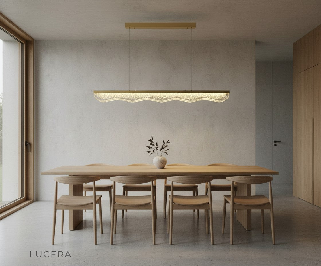 nighttime lifestyle shot of warm gold chandelier casting soft glow in a stylish bedroom lounge