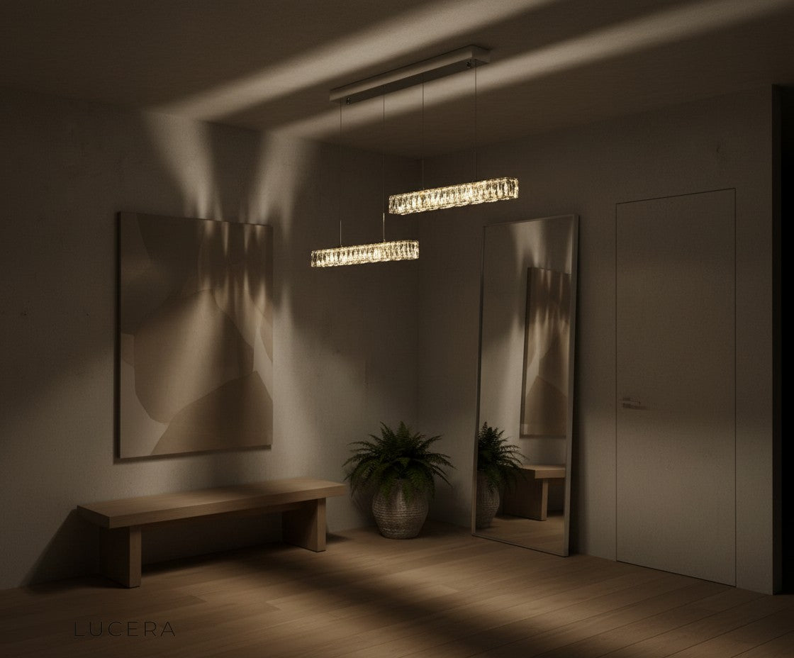 Gerd crystal pendant LED light in cozy reading nook with remote control on side table