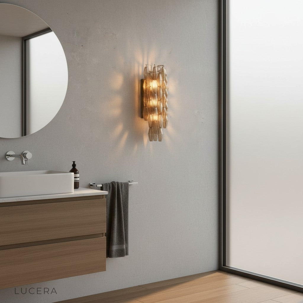 Waterproof UL-certified Frieze wall lamp glowing against textured wall in evening setting