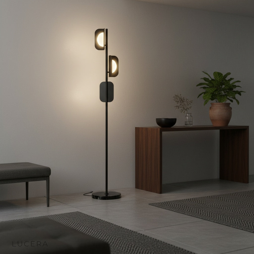 sculptural glacial floor lamp beside armchair in elegant loft with soft evening lighting
