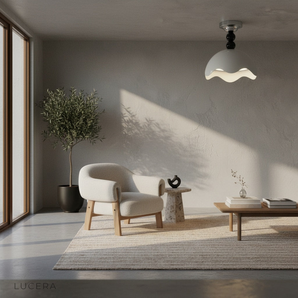 Aegis ceiling light at night illuminating a stylish dining room with pendant accents