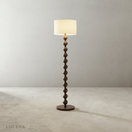 Cusp Floor Lamp studio view on clean beige background showing tall silhouette