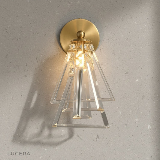 Studio shot of copper Hebe Wall Lamp with crystal shade on white background