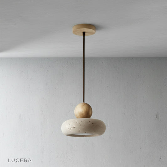 Studio shot of Mensa Pendant Light with natural travertine shade and wooden sphere
