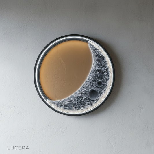 Studio shot of Haldor Moon Wall Lamp front view with detailed craters on matte black finish