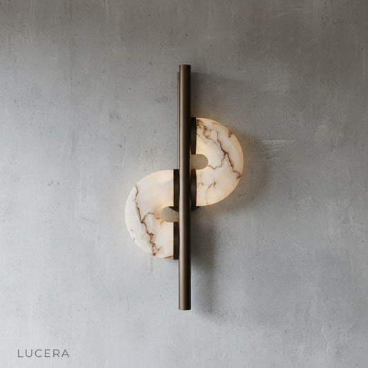 studio shot of Inception wall lamp front view with textured alabaster shade
