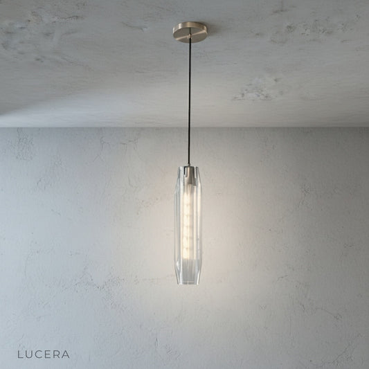 Hester Pendant Light studio shot side angle showing elongated crystal and minimalist metal