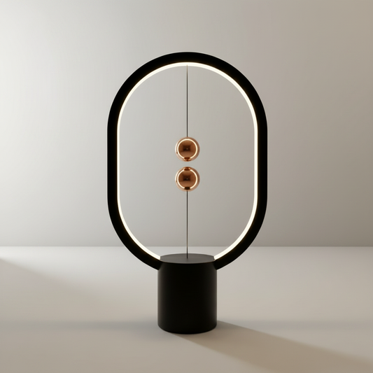 Vita Table Lamp studio shot on clean white background showing magnetic sphere base and integrated LED ring