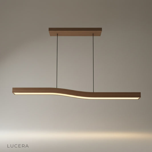 studio shot of Tenebrous pendant light with flowing linear silhouette on clean background