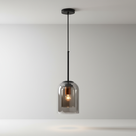 studio shot of Theodora pendant light with clear glass globes and brushed brass hardware