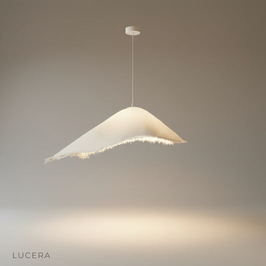 studio shot of white fiberglass pendant light against clean neutral background