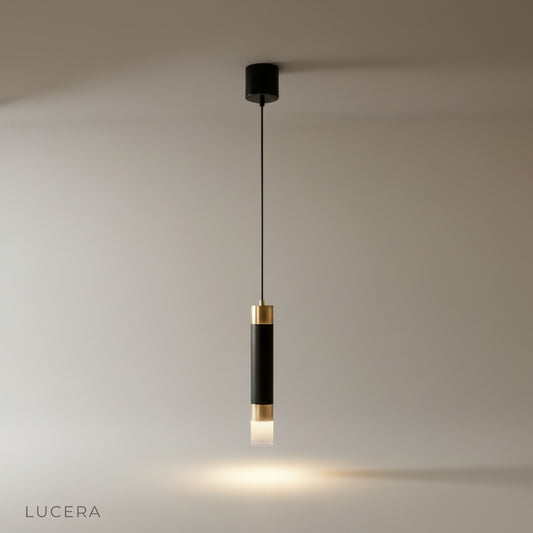 studio shot of black and gold boudoir pendant light with frosted acrylic diffuser