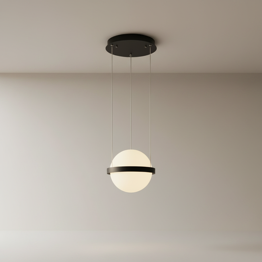 Studio shot of Serenade Pendant Light with spherical frosted glass and iron bands