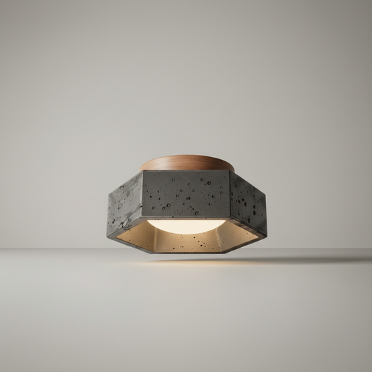 Studio shot of round travertine ceiling light with warm concealed LED glow