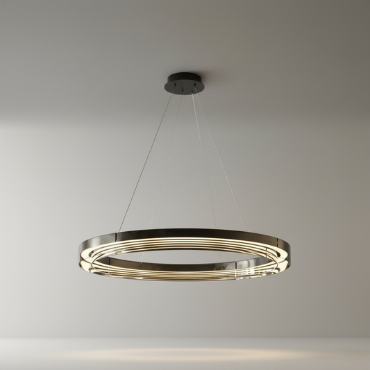 Studio shot of polished aluminum and steel Vortex Ring Chandelier centered on clean white background