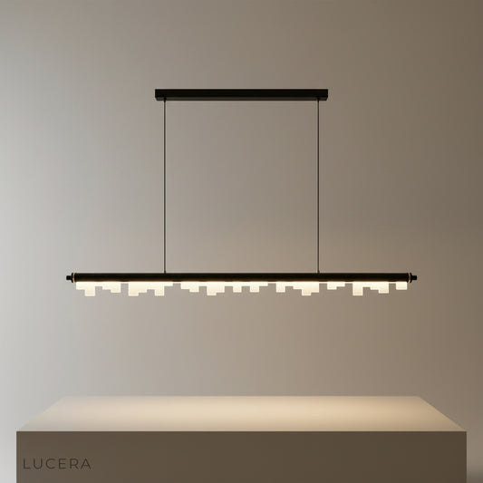 Studio shot of the Fascinating Pendant Light with sleek aluminum frame and geometric acrylic diffusers