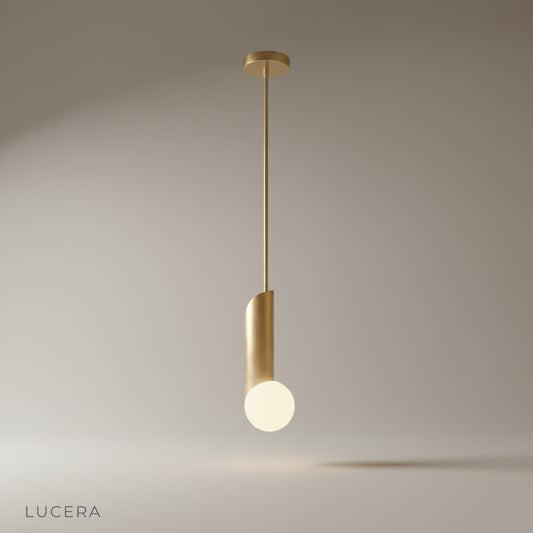 studio shot of Yancy pendant light with sleek metal rod and iron details on clean background