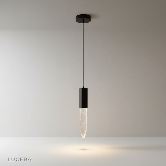 studio shot of Terra pendant light with elongated crystal diffuser on clean white background