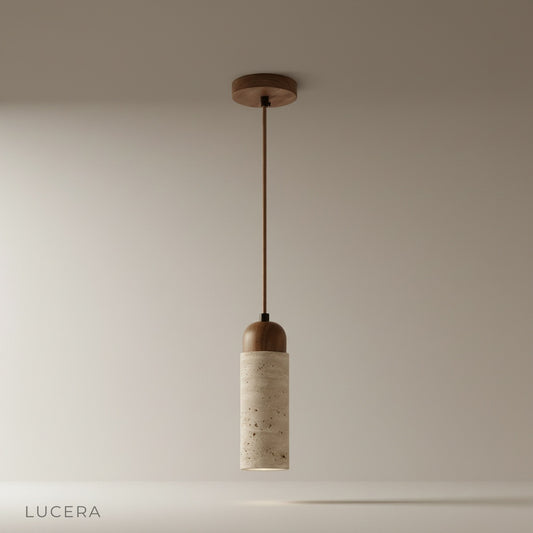 studio shot of Uzo cylindrical natural travertine pendant lamp on clean beige background