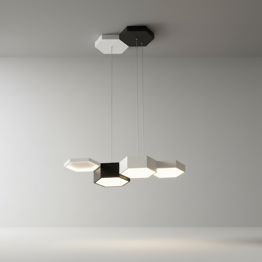 Moraine Pendant Light studio view showing three-tier hexagonal black iron frame with clear acrylic panels