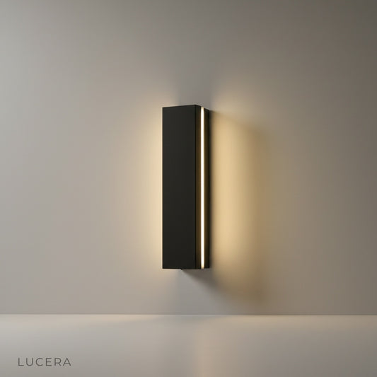 Minimalist white powder-coated aluminum wall lamp on a clean studio background