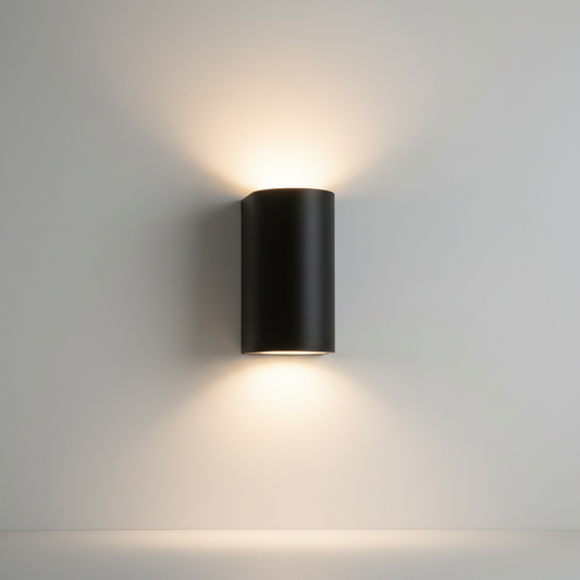 studio shot of rectangular LED wall sconce with up and down light bars