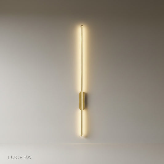 studio shot of sleek aluminum baptism wall lamp with long LED tube on white background