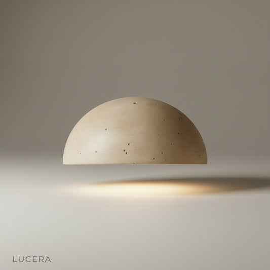 Studio shot of Nimbus Travertine Wall Lamp front view on neutral wall