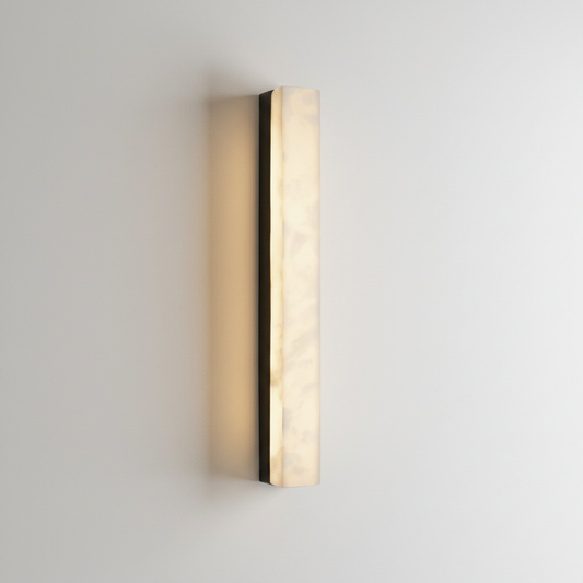 Dara wall lamp front view on clean white studio background showing alabaster shade