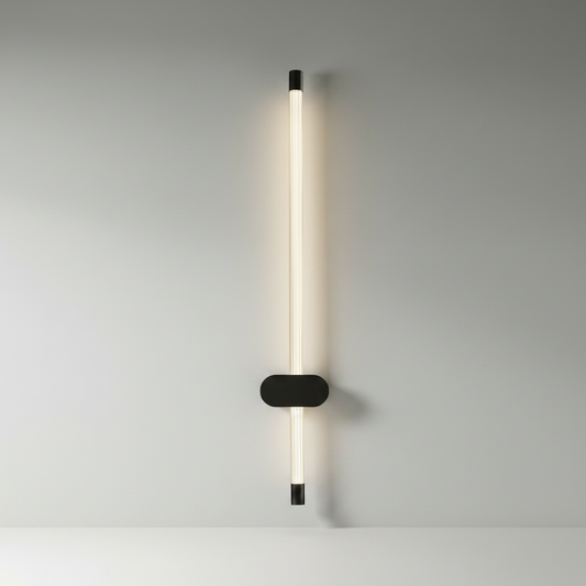studio shot of matte black yoke wall lamp with LED light bar on clean white background