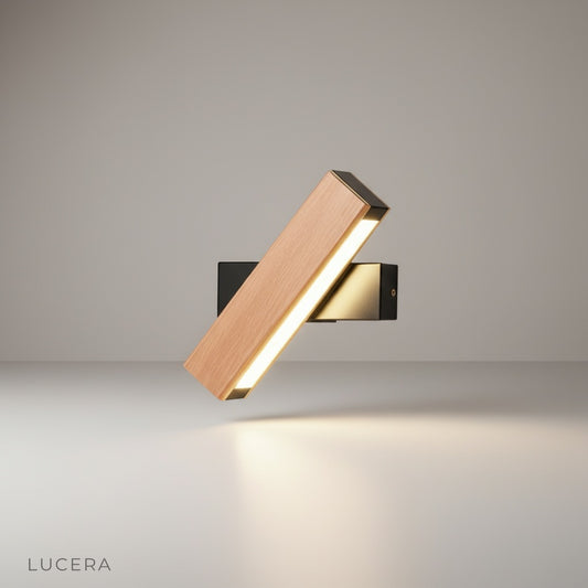 Quodlibet Wall Lamp front view studio shot on clean white background with rotatable light