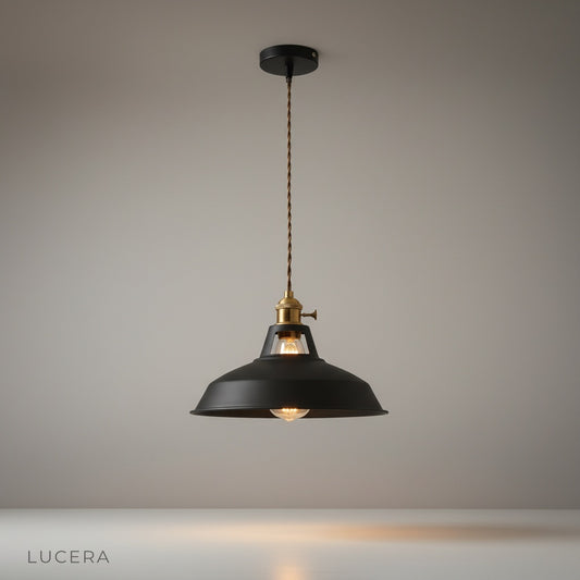 Studio shot of the Brim Block Shade Pendant Light with pastel color block shade and black iron cord
