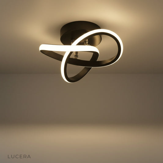 Flow ceiling light studio shot on clean white background showing iron body and acrylic shade