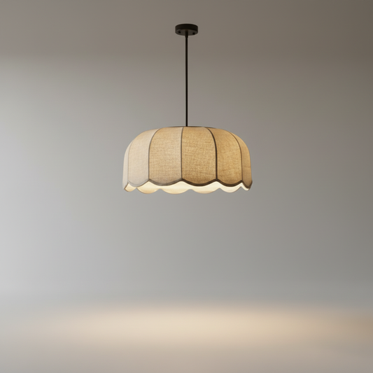 Zefiro pendant light studio shot on clean white background showing scalloped fabric shade and iron frame