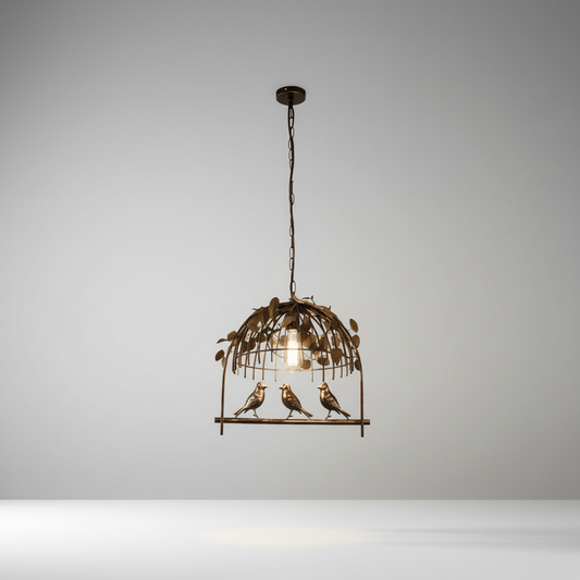 Black wrought cage chandelier centered in a bright studio setting