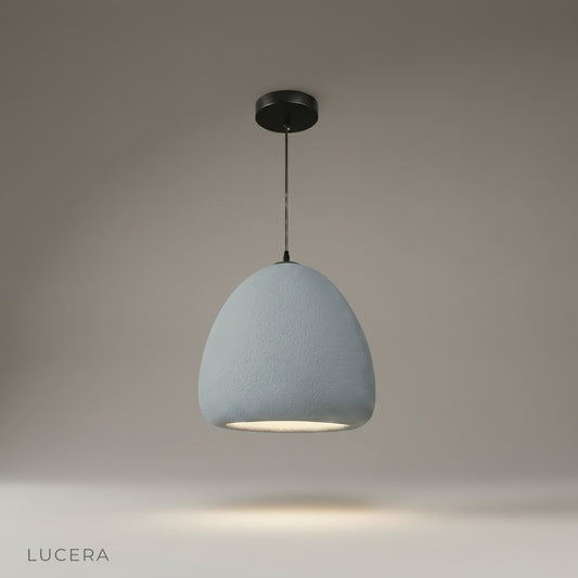 Studio shot of the Gavotte dome pendant light with matte white finish on a clean gray background