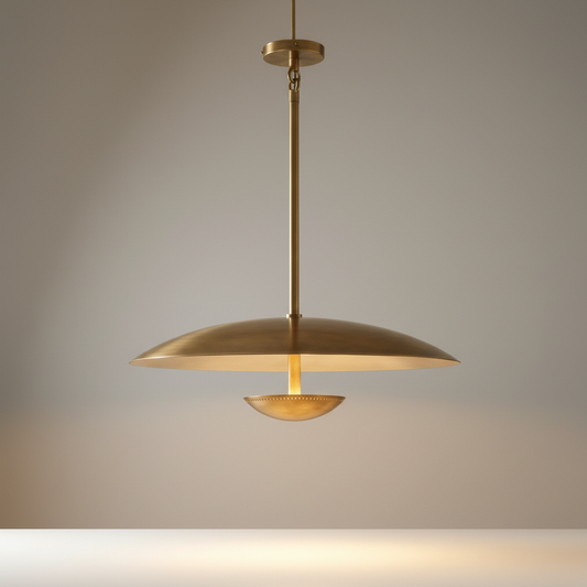 studio shot of Ravish wide disc brass pendant light front view on clean neutral background