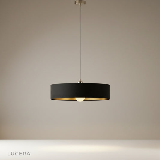 Studio shot of Haloed pendant light with white fabric shade and metal frame