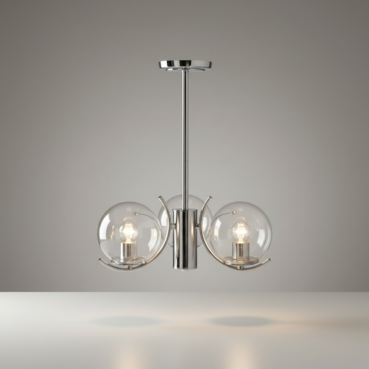 studio shot of chrome finish glass globe chandelier with curved iron arms on white background