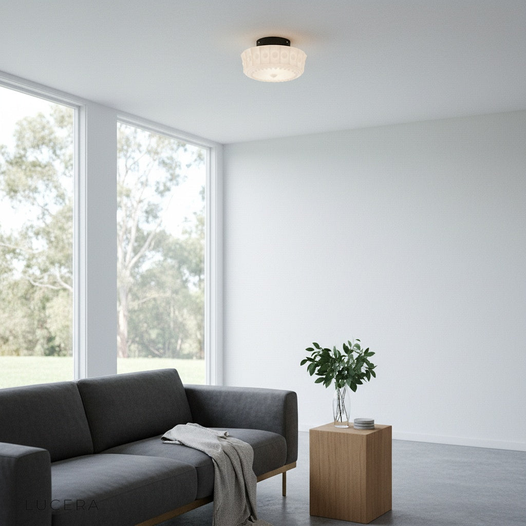 Xystus vintage-inspired ceiling light casting patterned light in a stylish reading nook