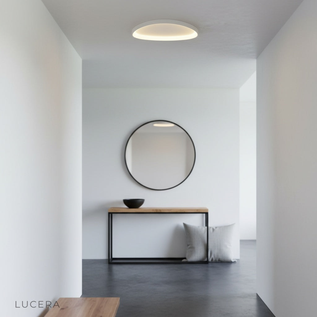yurt ceiling light with remote control on table, showing adjustable brightness in loft interior
