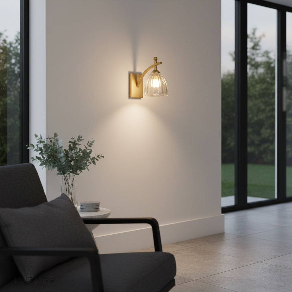 Canon wall lamp gold iron arm in elegant living room setting