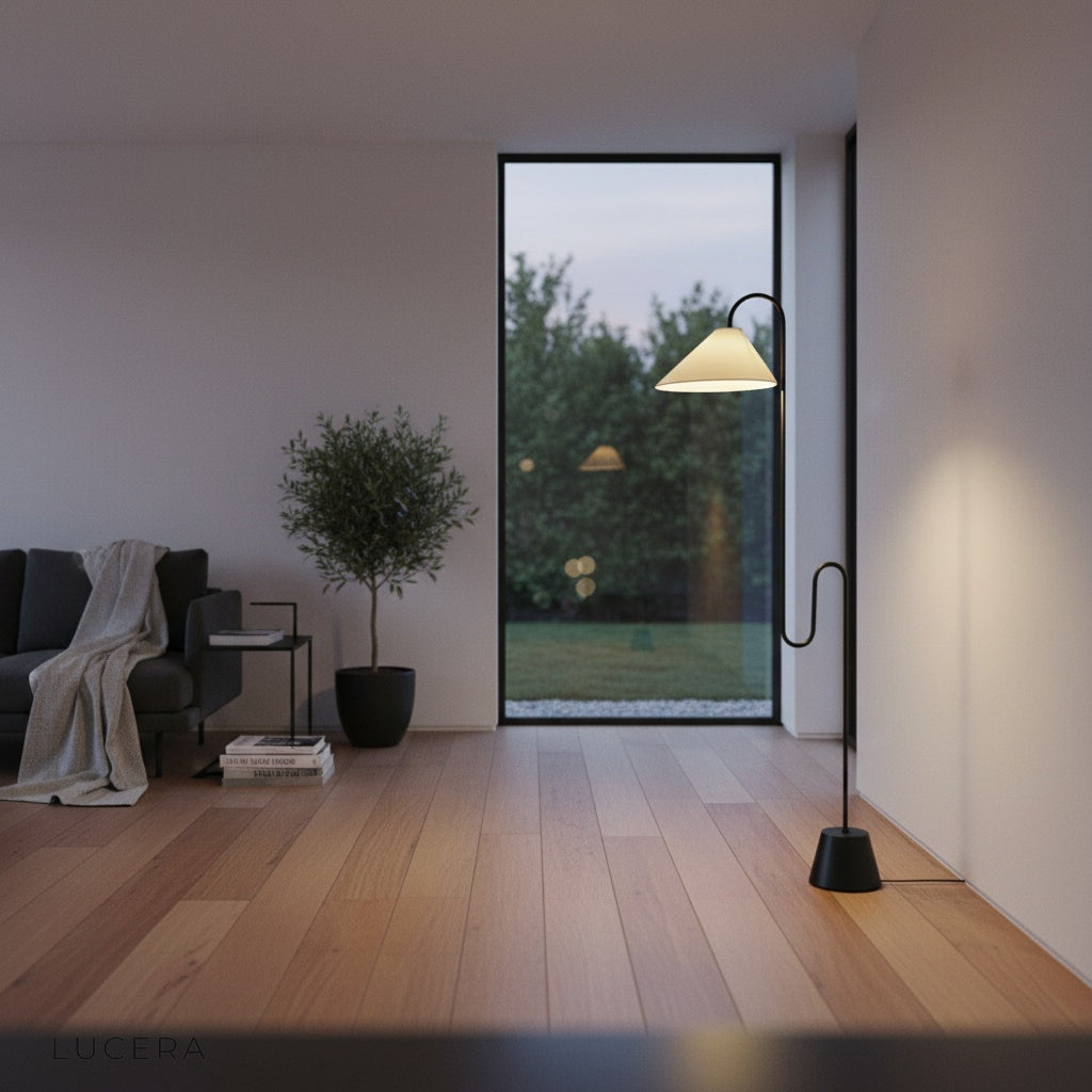 Plaudit Floor Lamp lit at dusk in elegant hallway with warm shadows