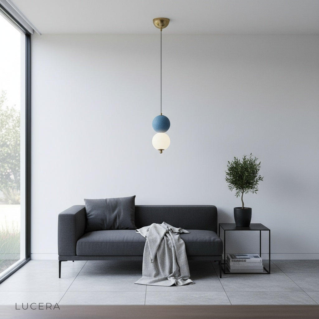 Sogno pendant light casting patterned shadows on a textured plaster wall in an eclectic lounge at night