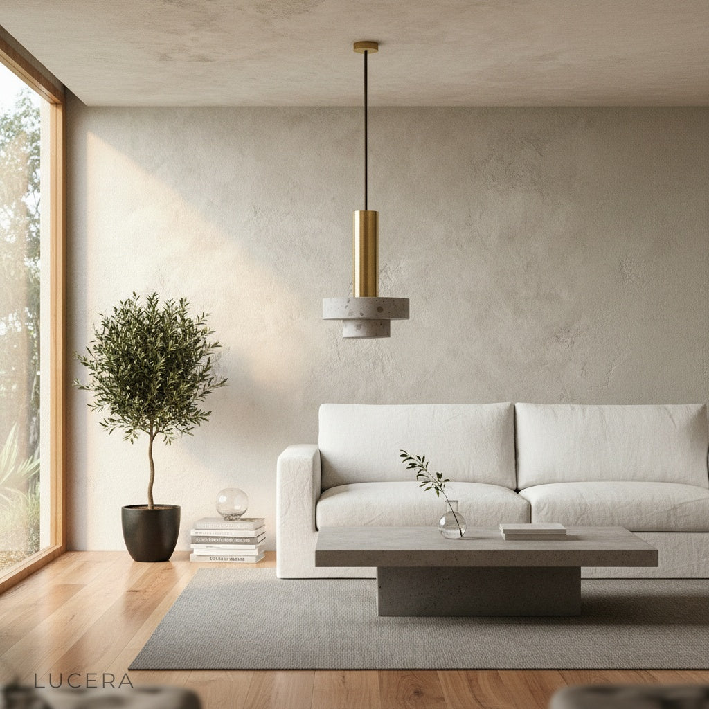 cielo pendant light as focal point in minimalist hallway with rose gold metallic reflection