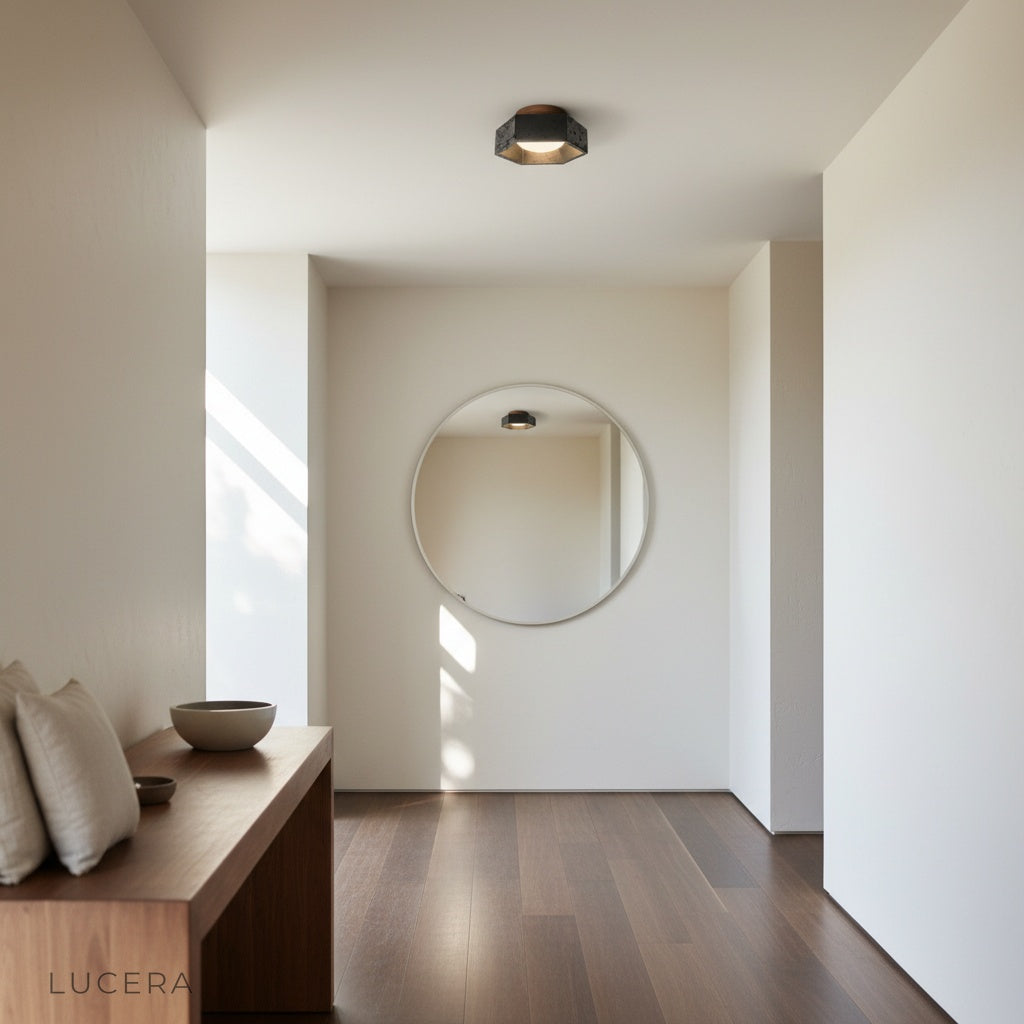 Xeric ceiling light casting warm ambient glow in a cozy bedroom at dusk