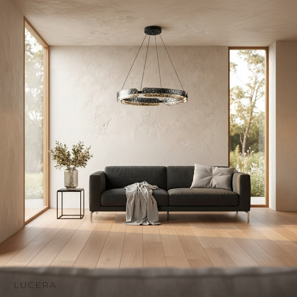 large size pristine chandelier in spacious loft with exposed brick wall