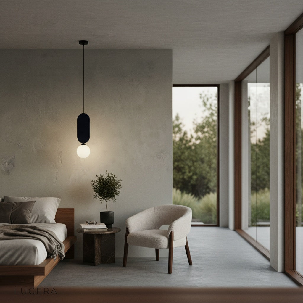 evening lifestyle shot of Karat pendant lamp in open-plan living area with plants