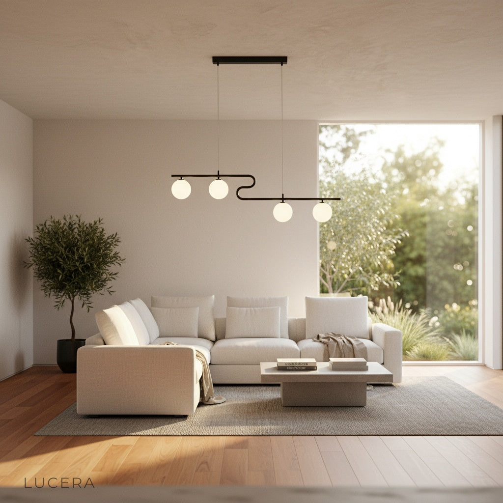 nighttime lifestyle shot of Quest pendant light illuminating stylish lounge area